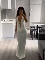 Two piece set of white top and long skirt