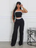 Strapless top paired with wide leg loose pants set