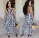 Low cut V-neck strap positioning printed jumpsuit