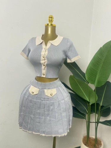Women's knitted cardigan and skirt