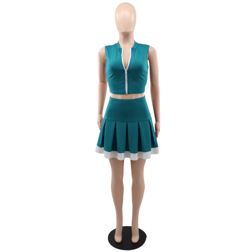 Two piece set of sleeveless cardigan, vest, exposed navel skirt