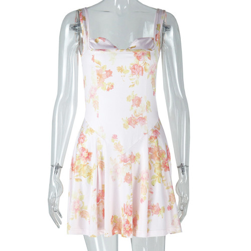 Backless printed A-line dress with camisole and waist cinching for a shorter look