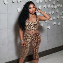 Hanging neck leopard print sequin large exposed backpack hip five quarter pants set