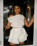 Two piece set of high waisted wide leg shorts with a one collar off the shoulder shirt