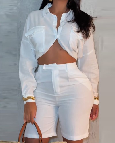 Loose long sleeved open waisted shirt and high waisted shorts set