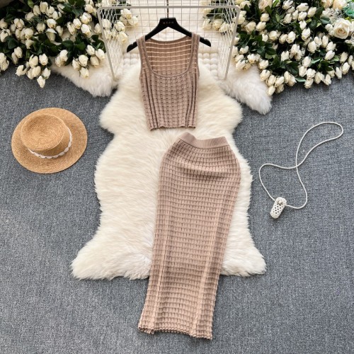 Short vest top paired with high waisted half body knitted skirt two-piece set