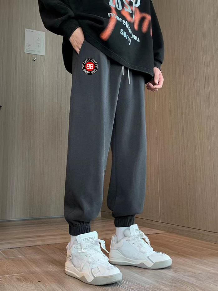 高品質 バレンシアガ 偽物通販 赤い丸印アルファベットロゴプリントのカップル向けパンツ
