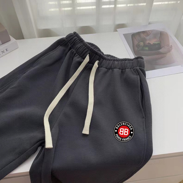 高品質 バレンシアガ 偽物通販 赤い丸印アルファベットロゴプリントのカップル向けパンツ