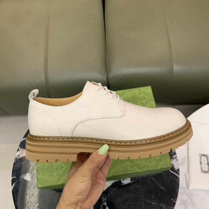 大人気 グッチ 偽物通販 の新品ビジネスブーツの全頭層の牛革押し花の古典的な菱格子模様工芸