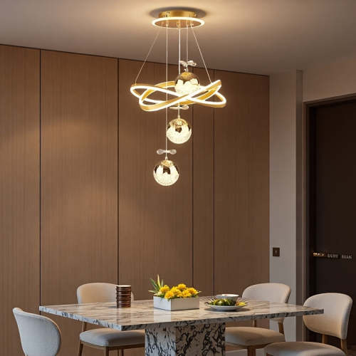 An LED pendant light with 3 spherical lamp heads and a surrounding light ring, featuring adjustable three color temperatures, adjustable height, and illuminated base; suitable for living room, dining room, bedroom, etc