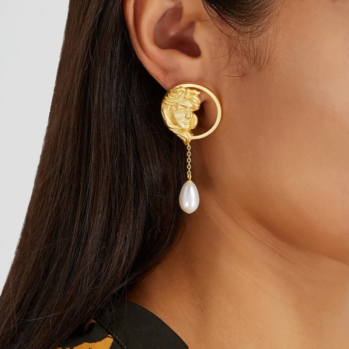 European and American pearl earrings female S925 sterling silver needle retro ear studs hollow portrait metal earrings ins earrings