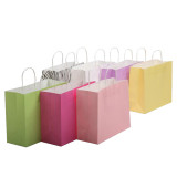 Wholesale colorful twisted kraft gift paper shopping tote custom takeaway bag
