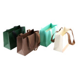 wholesales China paper bags suppliers cheap custom logo and printed shopping gift bags