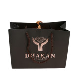 Luxury personalized style customizable size black kraft paper bag with gold foil logo bags for clothing packaging