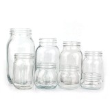 Wholesale wide mouth clear 4oz 8oz 12oz 16oz 32oz glass mason jar for jam honey food with metal lid