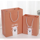 Factory custom shopping paper bag with logo recycled printing cartoon lovely gifting paper bags with handle