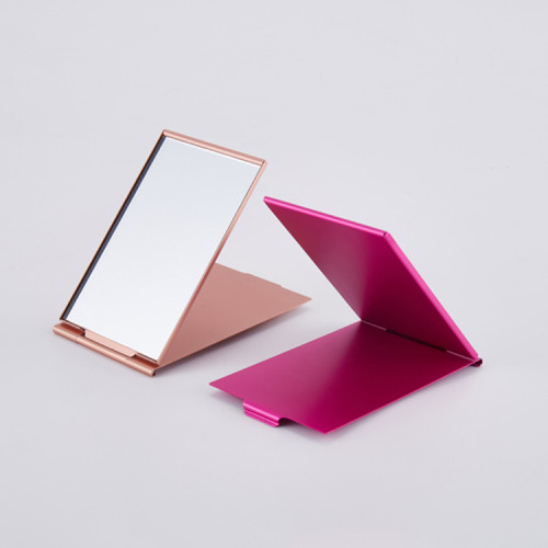 Hot selling customizable portable vanity mirror hand pocket magic makeup mirror mini makeup mirror