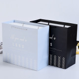 New Gold Logo Hot Foiled Stamping Black Matt Kraft Paper Bag With Cotton Rope Handles