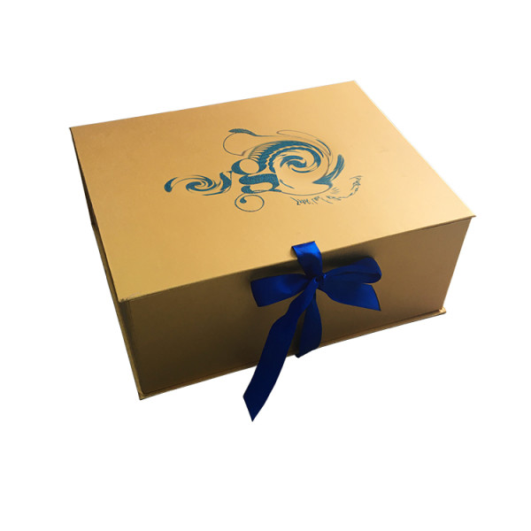 Matt yellow gold ribbon design box with sinly glitter blue logo on paper suitcase bridal gift packaging box
