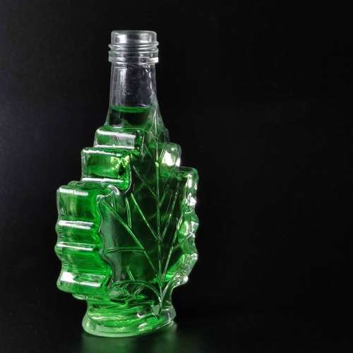 Fancy design unique shape  juice beverage liquor glass bottle