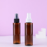 Cosmetic clear spray bottle 2 4 oz 60ml  100ml 150ml 200ml 250 ml green pet plastic spray bottles with spray tops