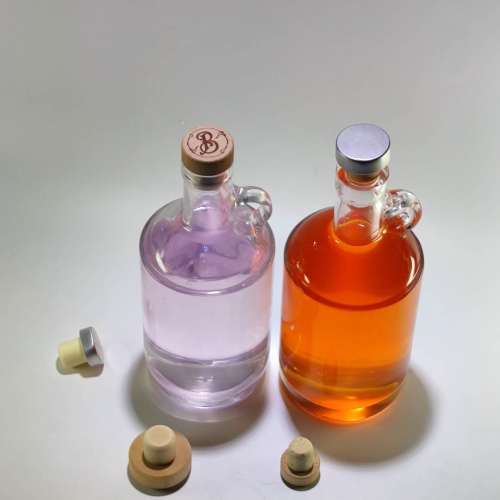 Wholesale 750ml round empty glass rum bottle with hook