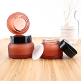 Luxury 15ml 30g 50g 100g empty glass face lotion containers matte frosted amber black glass cream jar with screw lids