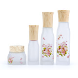 Premium 50 g 1.7 fl oz transparent matte face cream packaging wooden glass cream jars with bamboo lid for skincare
