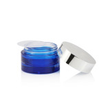 Custom thickness bottom  transparent blue glass cosmetic 50 ml 15 ml glass jar with metal lid for skin care