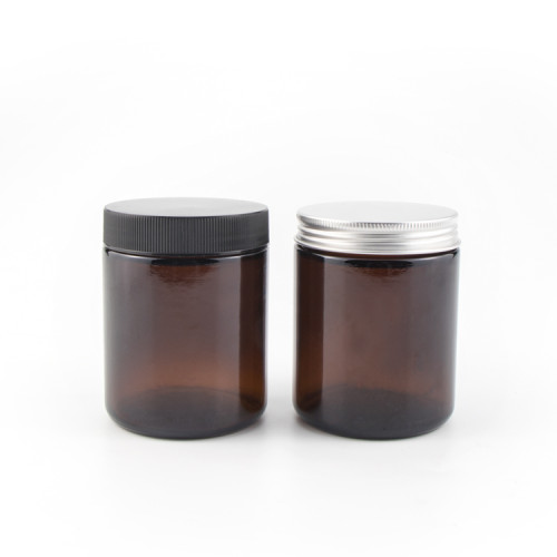 Customized round container amber clear food grade glass jar with metal aluminum lids for honey chocolate cream