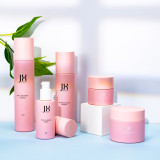 Custom 30 50 80 g empty round lotion skincare cream glass jars empty frosted pink glass cosmetic jars  30 50 ml