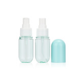 Refillable 40ml 60ml lotion pump transparent packaging blue pink clear color pill capsule shaped plastic bottle