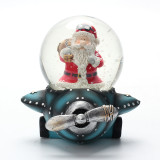 Featuring water polo base Santa Claus snow globe