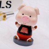 Funny and cute Marvel hero Piggy playing the role of bobble head