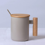 Hot sale gift porcelain mug, bamboo lid ceramic cup with lid and spoon, wooden handle ceramic coffee mug