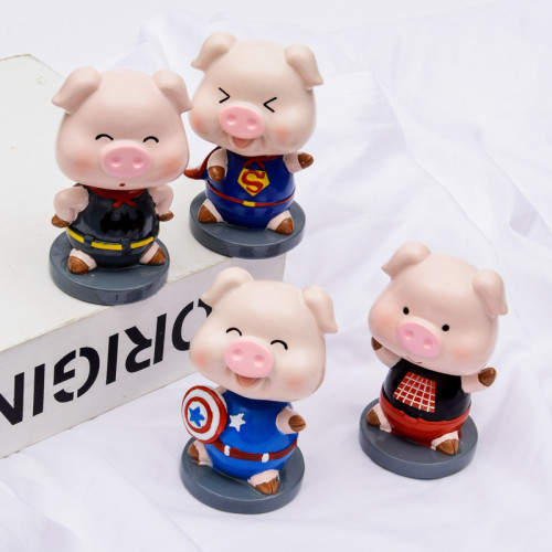 Funny and cute Marvel hero Piggy playing the role of bobble head