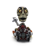 Features easter themed skull corpse bobble head