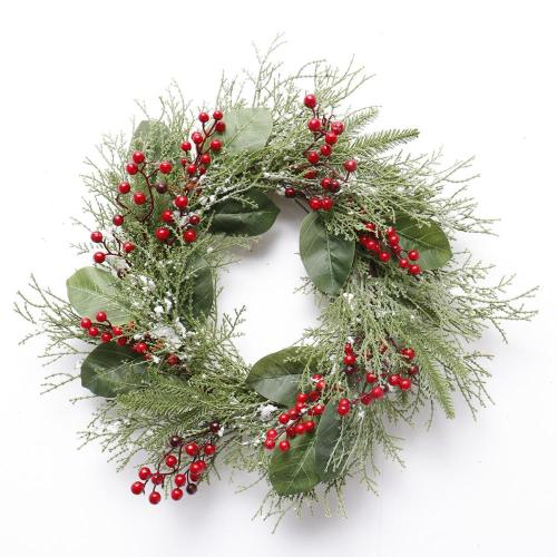 classic green leaves with snow and red berries Christmas wreath for Christmas and home decoration