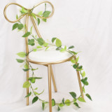 Amazon hot silk eucalyptus leaves vertical artificial grapevine leaves hanging green wreath Ivy manufacturers wholesale
