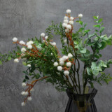 Simulation of small sea urchin Eucalyptus bundle front desk living room decorated with artificial plants