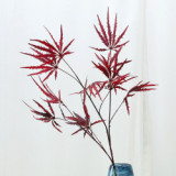 Wedding hall decoration hotel studio layout of artificial plastic tree branches and leaves simulated maple leaves