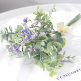 Eucalyptus leaves with  flowers and stars to decorate artificial green plants in wedding holding flowers