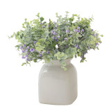 Eucalyptus leaves with  flowers and stars to decorate artificial green plants in wedding holding flowers