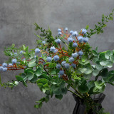 Simulation of small sea urchin Eucalyptus bundle front desk living room decorated with artificial plants