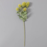 Artificial succulent potted vase with floral arrangement decorated with nice thistle flowers