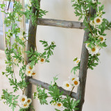 Simulation daisy flower rattan sunflower rattan air conditioning pipe winding background wall window decoration wedding flower