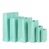 Wholesale Custom Kraft Brown Paper Flower Packaging Shopping Clothes Samll Gift Bag