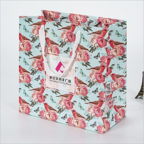 Exquisite handles shipping bag custom logo pajamas clothes packaging paper bags printing gift storage bags