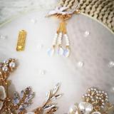 Chinese bride holding flowers round fan of classical Xiu clothing handmade diy