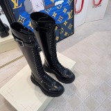 Alexander McQueen calfskin biker boots in original box